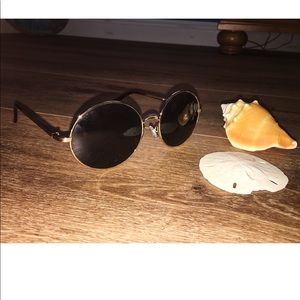 Round black sunglasses